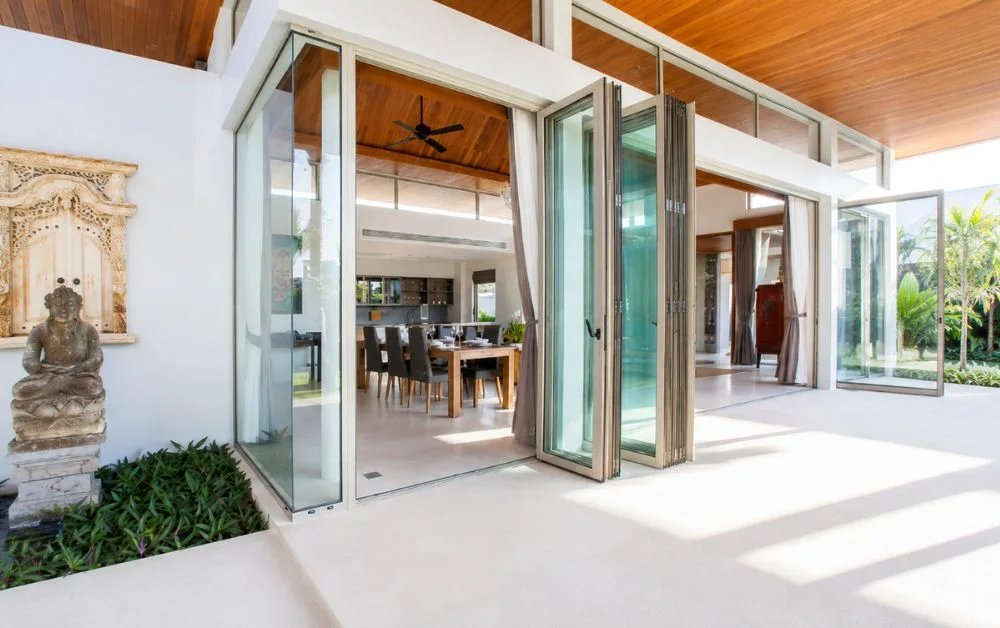 Why Luxury Villas in Dubai Prefer Frameless Bi-Folding Glass Doors